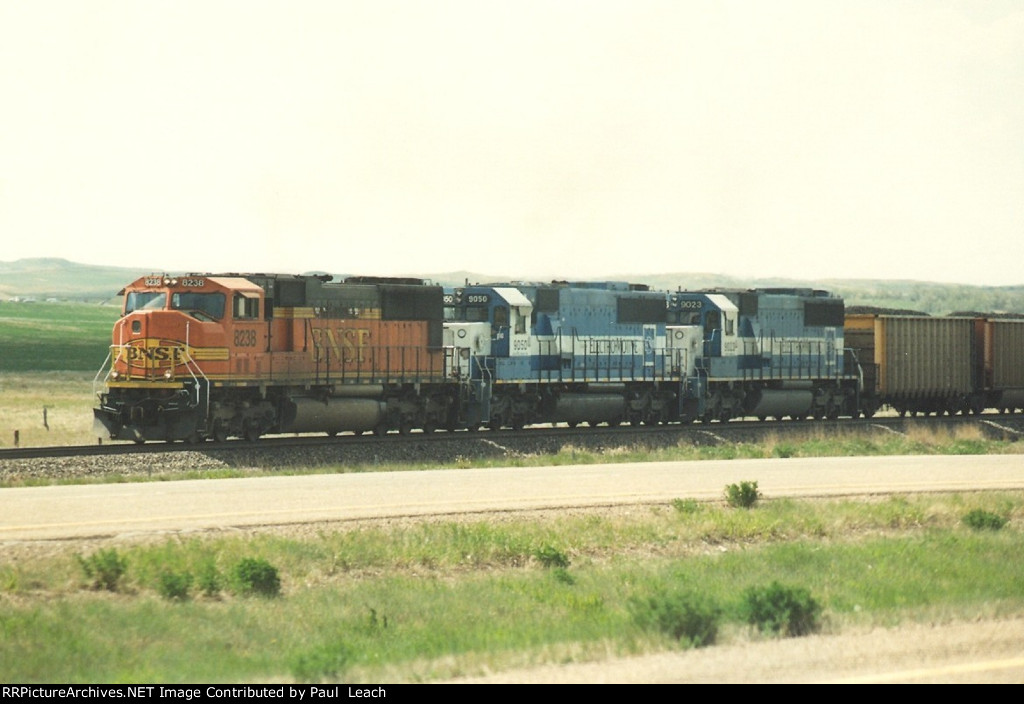 Loaded coal train rolls east